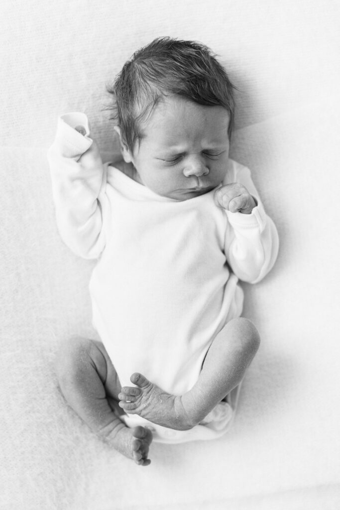 Newborn baby scrunch in my white vest in black and white