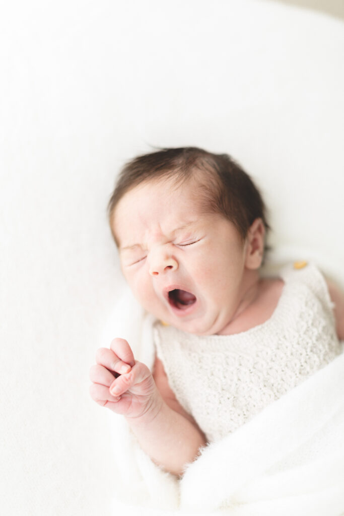 Yawning Newborn baby