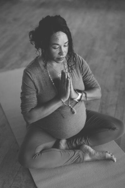 Expectant Mum in Namaste pregnancy yoga pose